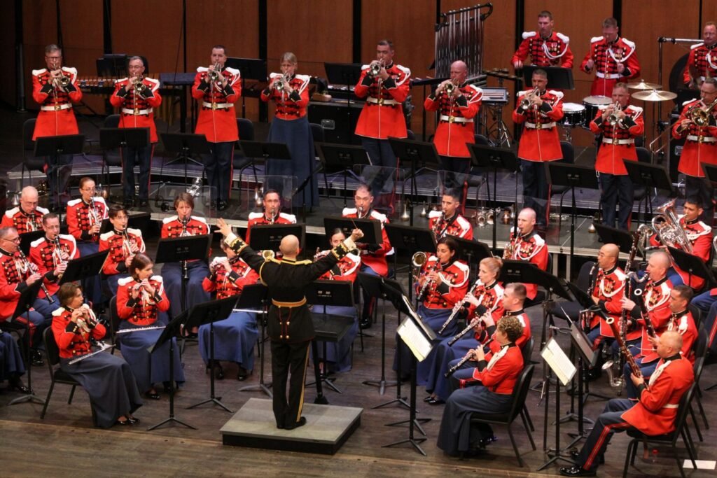 A concert band performing on stage